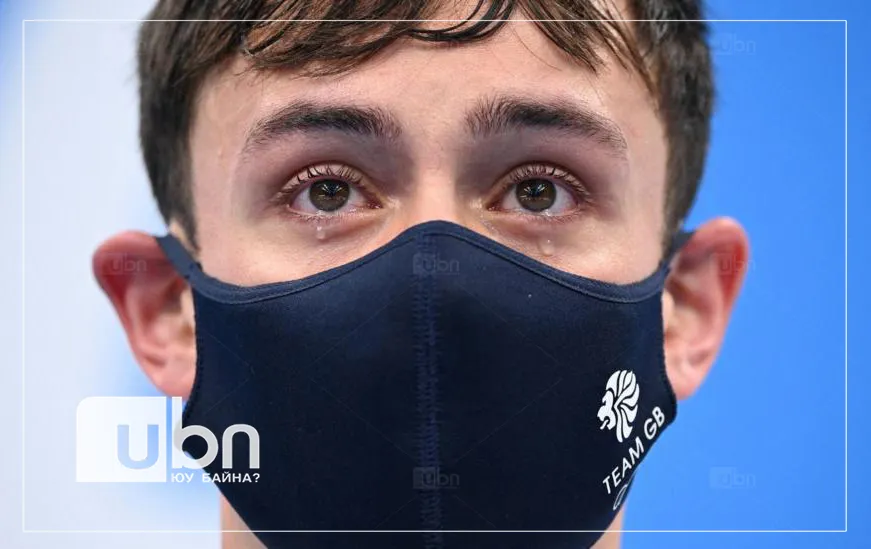 legacy:Olimpic games/ontsloh photo/Tom Daley receives his first gold medal at his fourth Olympics copy.jpg