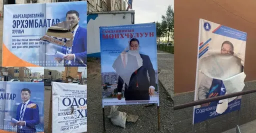 Нэр дэвшигчдийн сурталчилгааны самбарыг хутгаар сийчиж буй дүрс камерт үлджээ