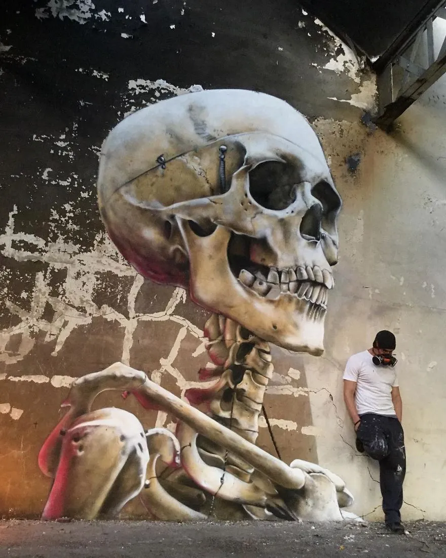 legacy:upload/images/ni/2020/06/26/The-graffiti-of-this-French-street-artist-seems-to-come-alive-and-come-off-the-walls-5ef33f7734f79__880-112551-1967045278.jpeg
