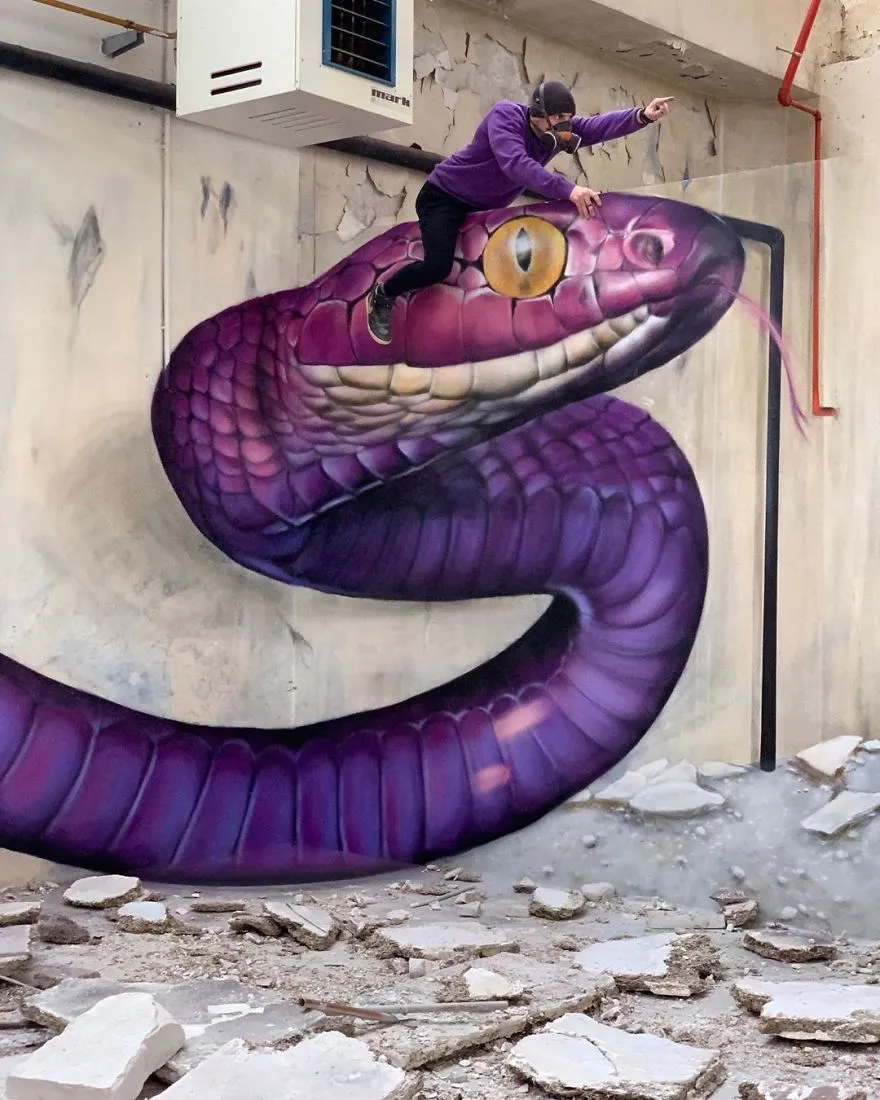 legacy:upload/images/ni/2020/06/26/The-graffiti-of-this-French-street-artist-seems-to-come-alive-and-come-off-the-walls-5ef33fd99ff55__880-114255-1997384557.jpeg