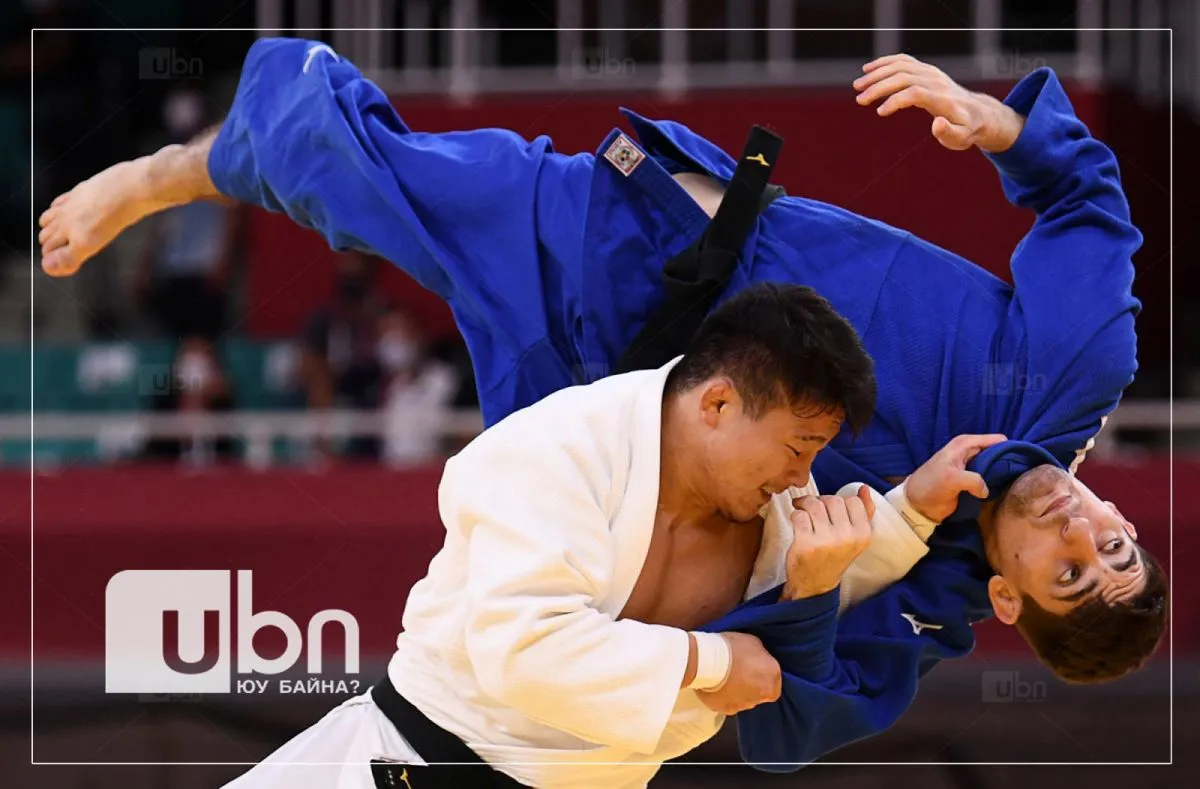 legacy:Olimpic games/ontsloh photo/Japan's Shoichiro Mukai, left, and Germany's Eduard Trippel compete in team judo on July 31. copy.jpg