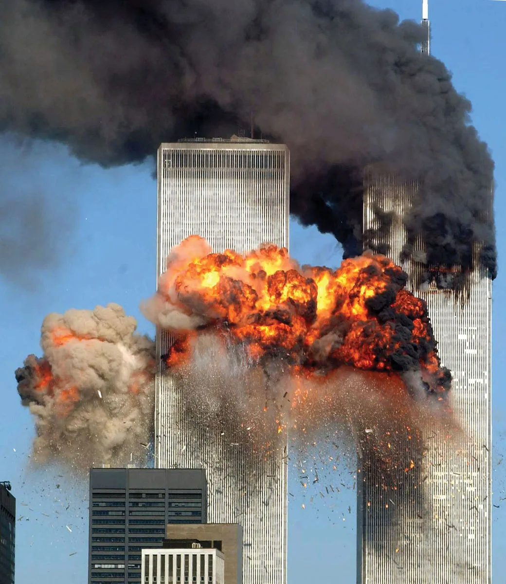 legacy:afghan taliban/Smoke-flames-twin-towers-attacks-World-Trade-September-11-2001.jpg