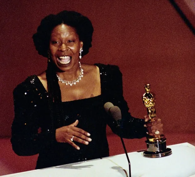 legacy:resources/images/photo_content/whoopi-goldberg-holds-her-best-supporting-actress-oscar-for-her-role-in-ghost-march-25-getty-2020-08-13-125952-549091577.jpeg