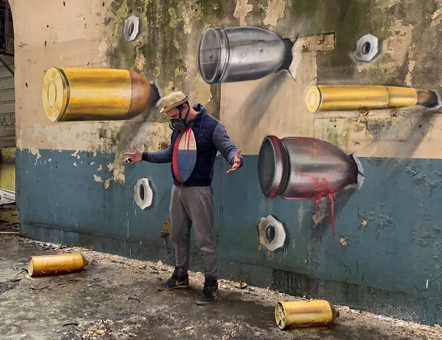 legacy:upload/images/ni/2020/06/26/The-graffiti-of-this-French-street-artist-seems-to-come-alive-and-come-off-the-walls-5ef33ff5e3a62__880-114017-147953932.jpeg